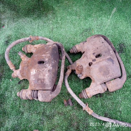 Суппорт тормозной Toyota Corsa