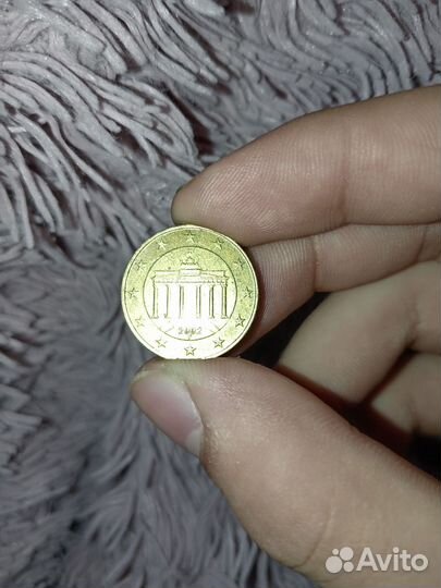 Продам монету 10центов 2002года