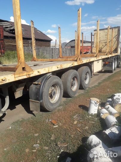 Полуприцеп лесовоз (сортиментовоз) МТМ 933011, 2000