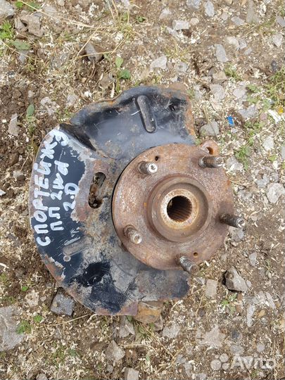 Kia Sportage 3 кулак передний правый