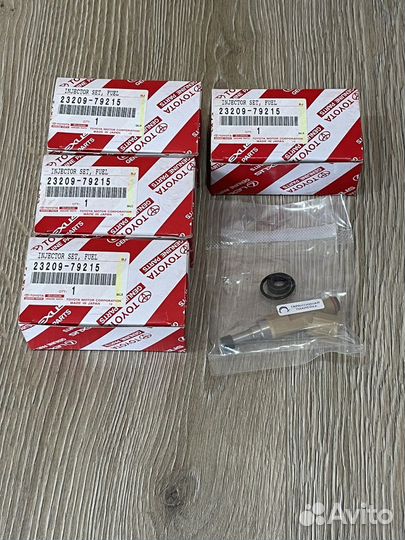 Форсунка топливная 23209-79215 2TR
