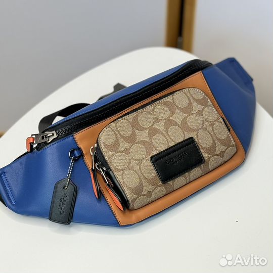 Поясная сумка Coach из канвы и кожи