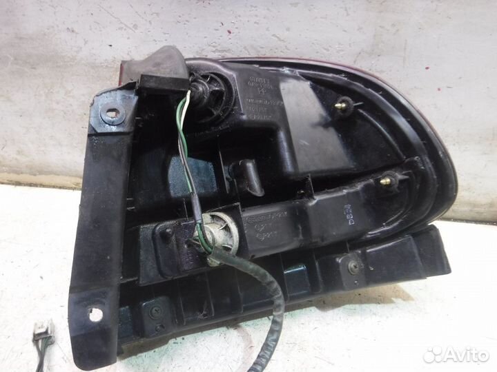 Фонарь задний левый Mazda 626 GE