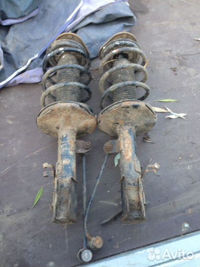 Передние стойки Джили Эмгранд EC7