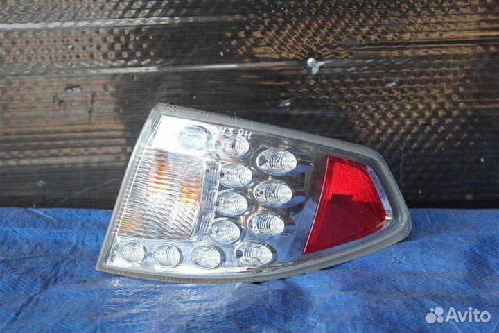 Фонарь subaru impreza G12