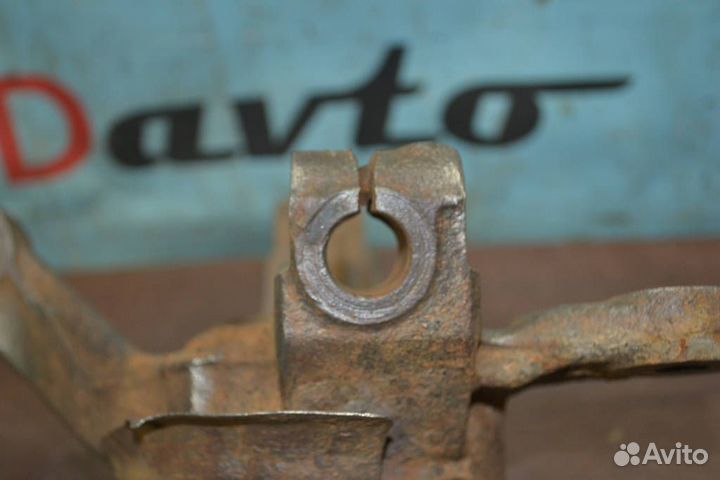 Кулак поворотный левый передний Mazda 323