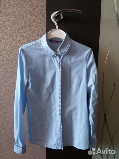 Блузка голубая 152