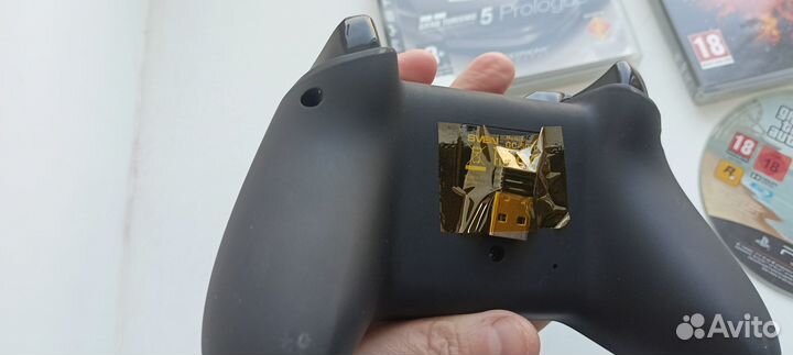Джойстик на playstation 3 и диски с играми
