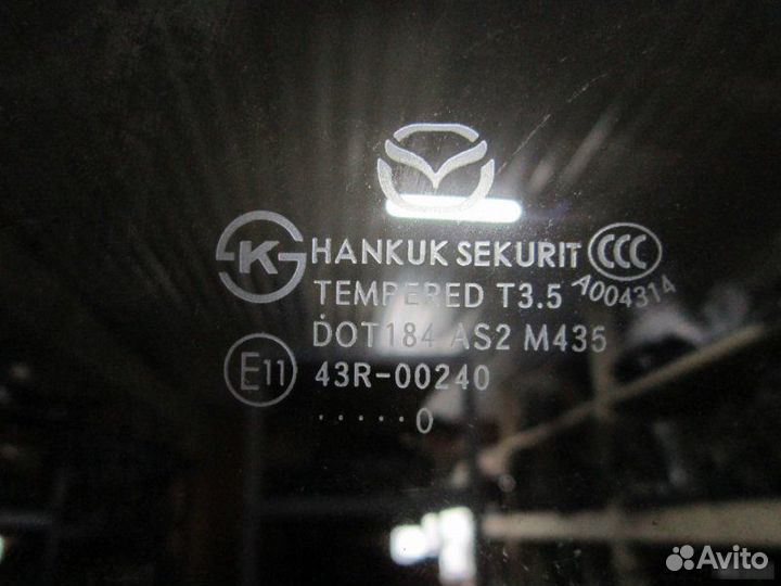 Стекло двери задней левой Mazda 3