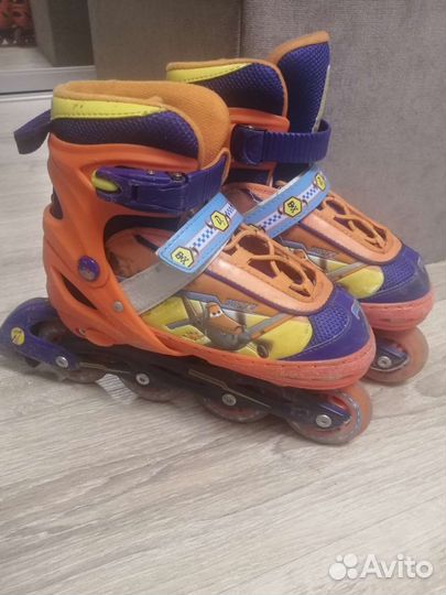 Роликовые коньки