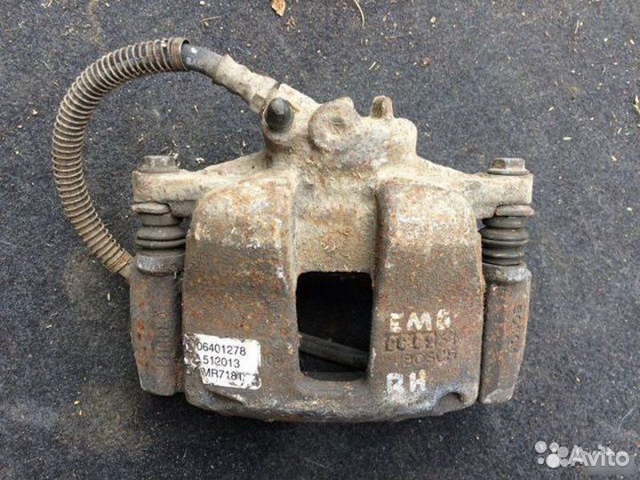 Суппорт передний правый Geely Emgrand Ec7