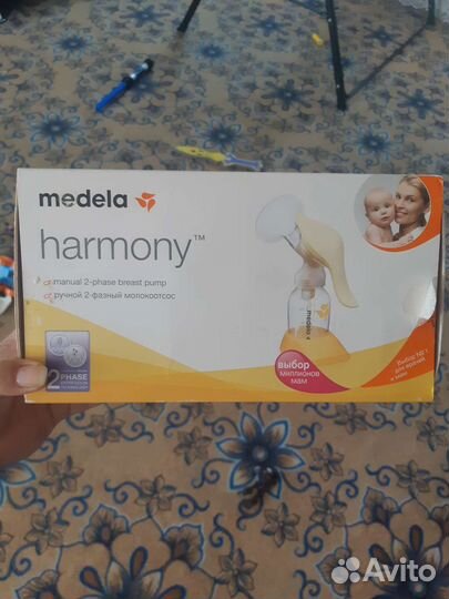 Молокоотсос medela ручной