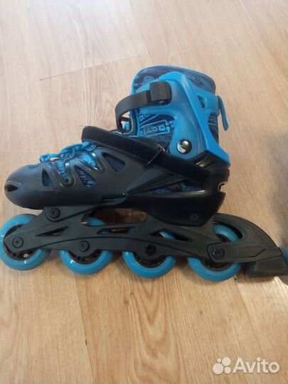 Роликовые коньки