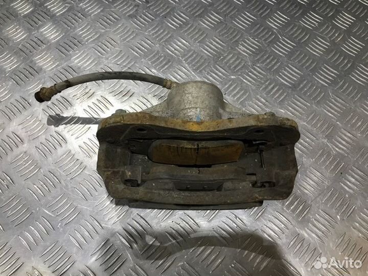 Суппорт передний левый Kia Cerato 2008