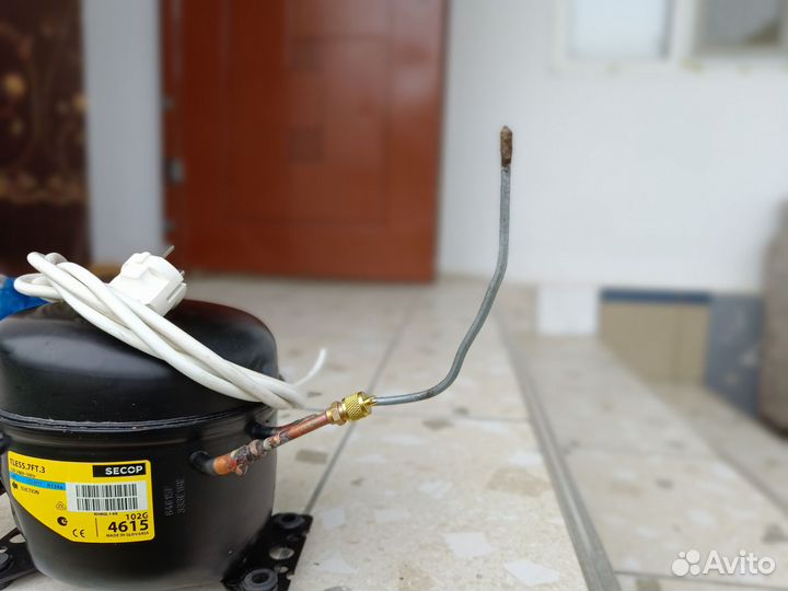 Компрессор для холодильника Tles