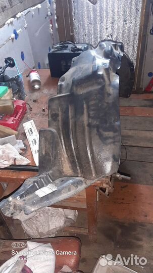 Подкрылок передний левый таета карона бочка новый