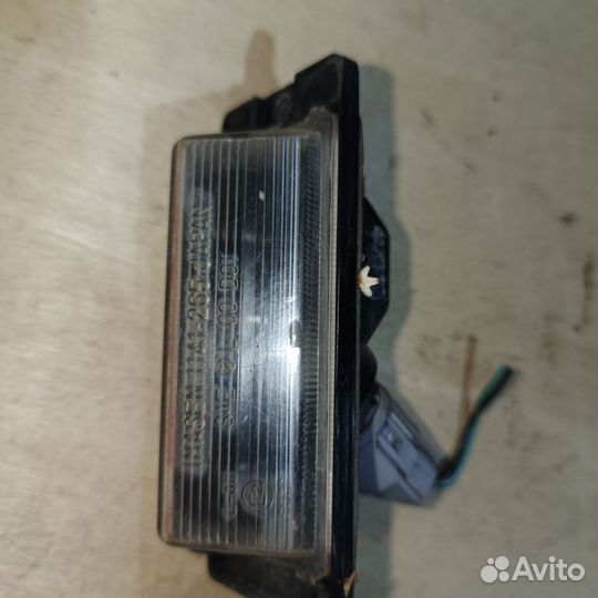 Фонарик подсветки номера Mitsubishi Lancer 2005г