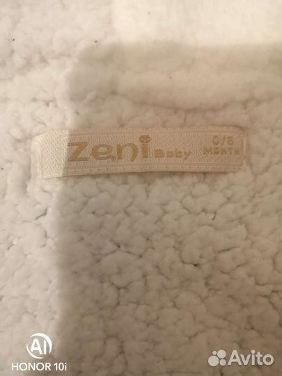 Вязаный комбинезон для новорожденного