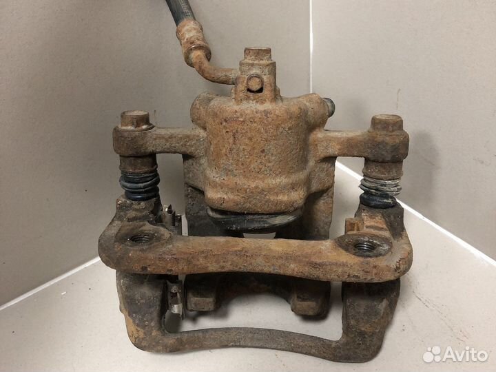 Суппорт тормозной задний LH SsangYong Actyon NEW