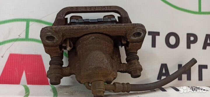 Суппорт задний правый Nissan Qashqai J10 HR16DE