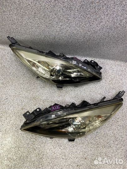 Фара Mazda 3 BL 2010