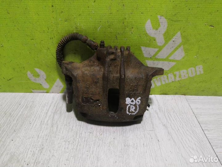 Суппорт передний правый Пежо 206