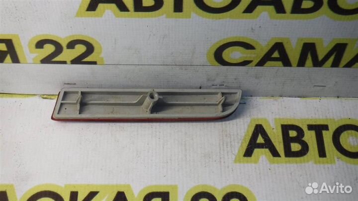 Отражатель в бампер задний левый Mitsubishi Lance