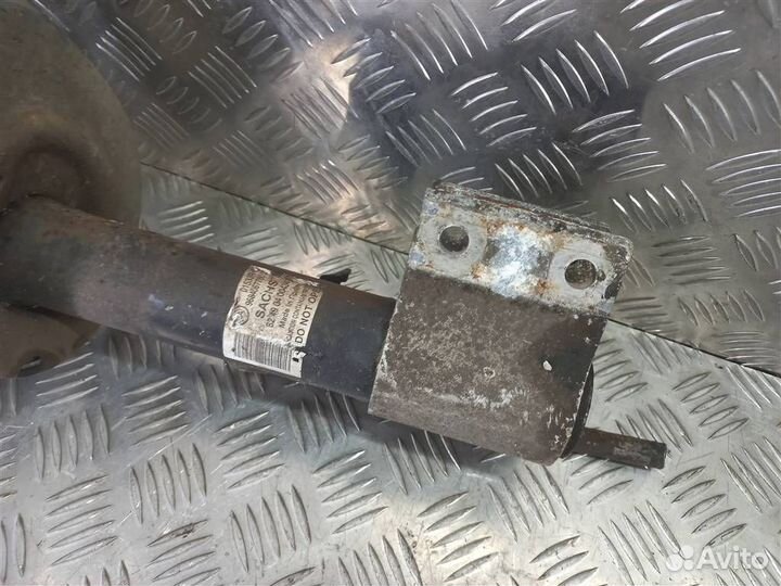 Стойка амортизатора передняя левая Ситроен Berli