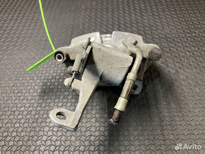 Суппорт тормозной задний левый Jaguar XJ X351 2012