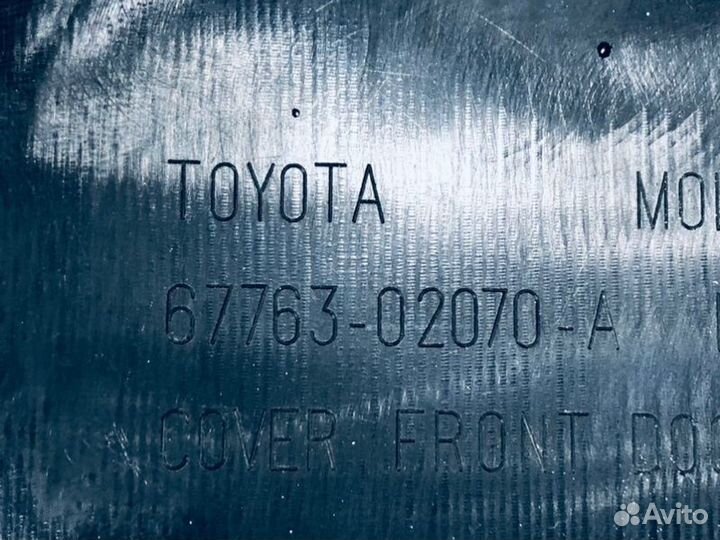 Обшивка двери передняя правая Toyota Corolla E12