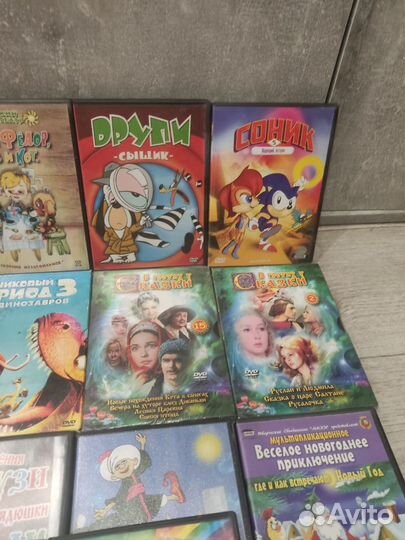 18 DVD дисков с мультиками за 1кг конфет