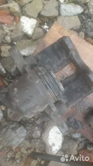 Суппорт левый ваз 2112