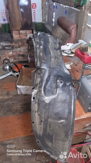 Подкрылок передний левый таета карона бочка новый