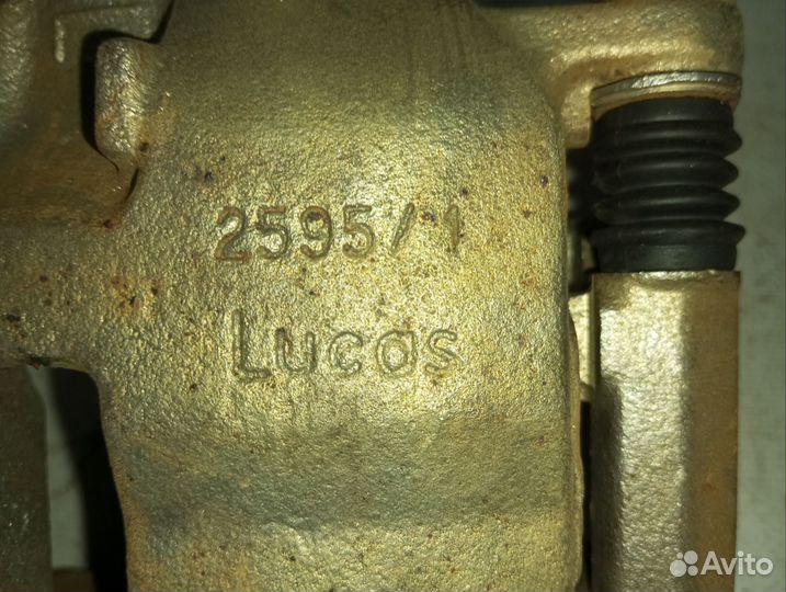 Суппорт передний левый Ниссан Примера P 12