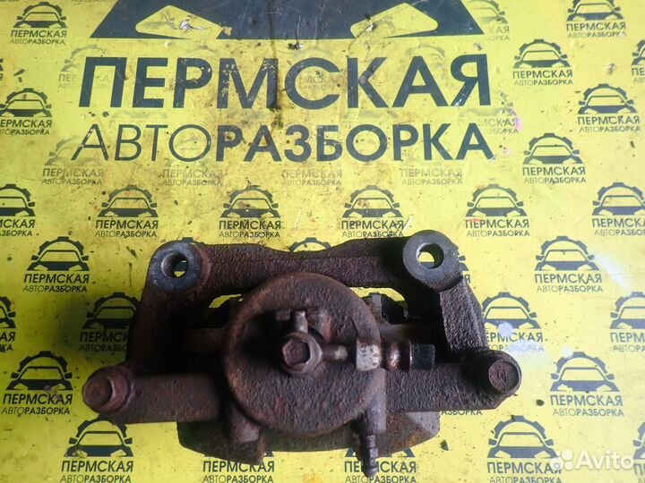 Суппорт передний левый Nissan Qashqai J10