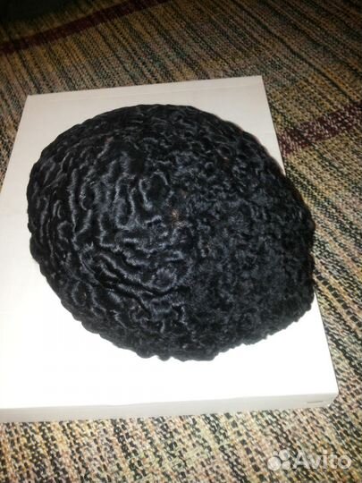 Шапки из каракуля и воротники