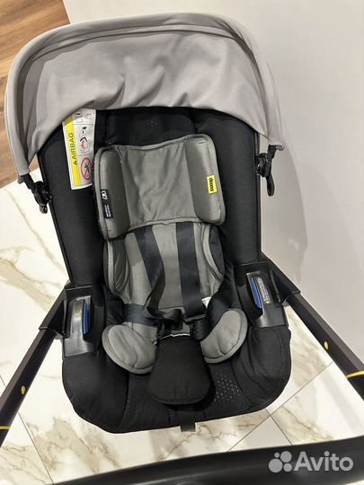 Автокресло-коляска Doona с базой Isofix