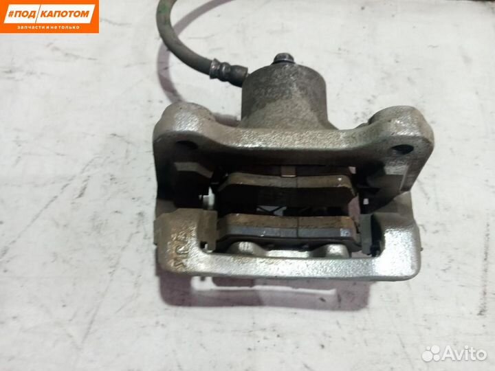 Суппорт тормозной задний левый Hyundai Tucson 3