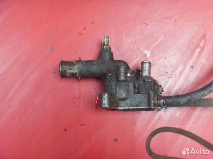 Корпус термостата 1632315180 Toyota Corolla Ceres