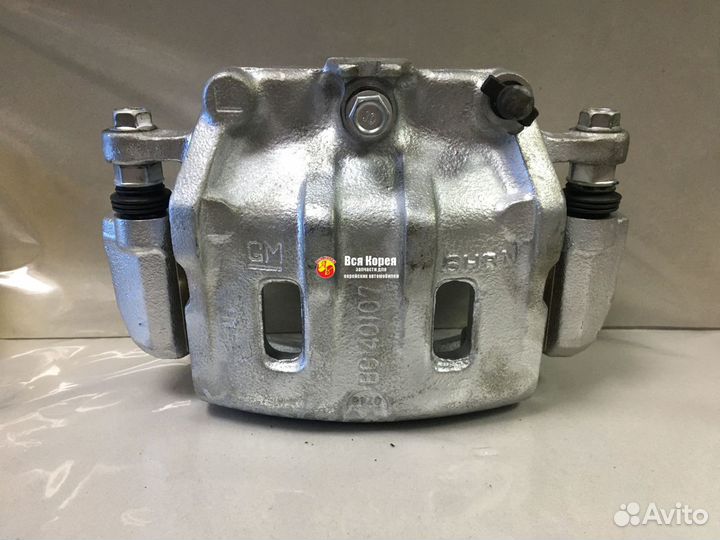 Суппорт передний LH Daewoo Winstorm