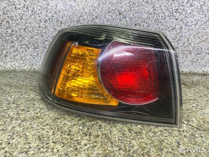 Фонарь левый Mitsubishi Lancer 10 2011