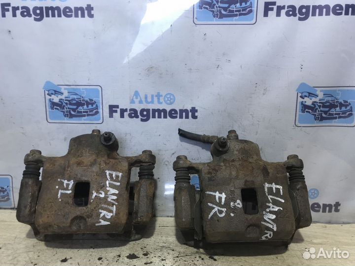 Суппорт тормозной передний Hyundai Elantra (J2)