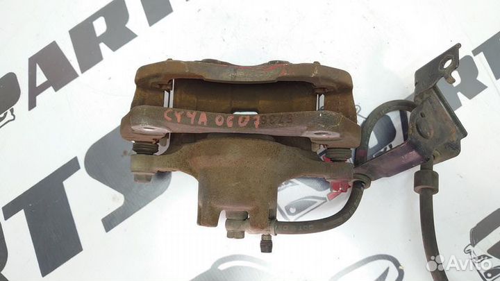 Суппорт тормозной передний Mitsubishi Lancer X (20