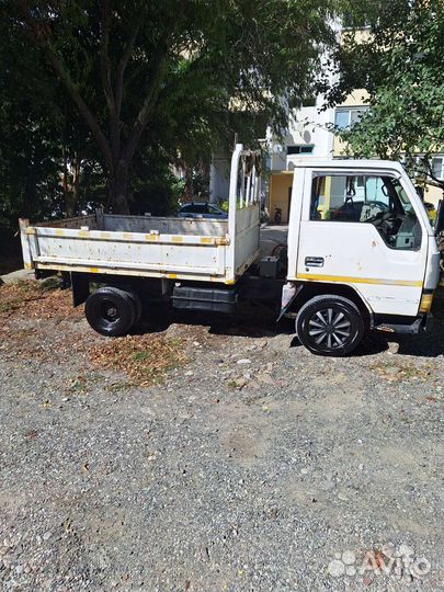 Mitsubishi Fuso Canter бортовой, 1990