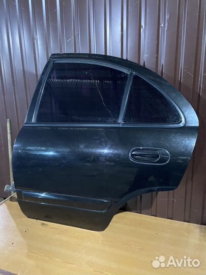 Задняя левая дверь на ниссан альмера классик