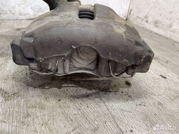 Суппорт тормозной передний левый Audi A6