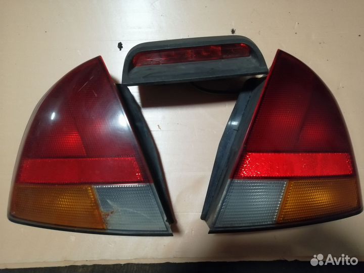 Фонарь задний левый Митсубиси каризма