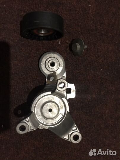 Натяжитель ролика ремня генератора