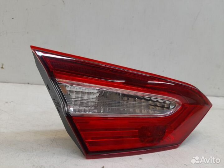 Фонарь в крышку багажника левый Toyota Camry XV70