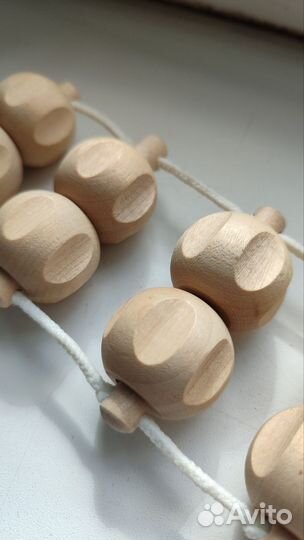 Роликовый массажер для спины деревянный